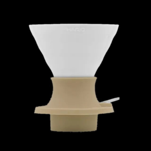 Ceramiczny dripper Hario V60 Immersion Switch w kolorze Smokey White, idealny do precyzyjnego parzenia kawy metodą przelewową. Wyposażony w innowacyjny mechanizm immersion switch, pozwala na pełną kontrolę nad czasem ekstrakcji. Doskonały wybór dla baristów i miłośników kawy speciality, którzy cenią sobie bogaty smak i aromat.