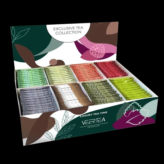 Luksusowy zestaw herbat Veertea Premium zawiera 200 kolorowych saszetek starannie ułożonych w eleganckim ekspozytorze z napisem „Exclusive Tea Collection”. Komplet oferuje szeroki wybór aromatyzowanych herbat w różnych smakach, idealnych do serwowania w biurach, hotelach i kawiarniach.