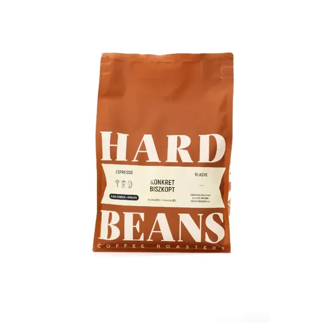 Opakowanie kawy HARD BEANS Konkret Biszkopt, przeznaczone do przygotowania esencjonalnego espresso. Idealny wybór dla miłośników intensywnego smaku i aromatu, wyróżniający się starannie wyselekcjonowanymi ziarnami.