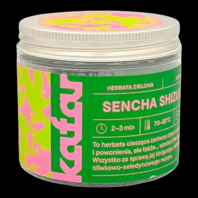 Zielona herbata Sencha Shizuoka od Kafar w szklanym słoiku z zielono-różową etykietą. Wysokiej jakości japońska herbata o delikatnym smaku i jasnym, oliwkowo-seledynowym naparze. Doskonała na ciepło i na zimno, ciesząca zarówno smakiem, jak i wyglądem. Idealny wybór dla miłośników herbaty zielonej poszukujących autentycznych aromatów z Japonii.